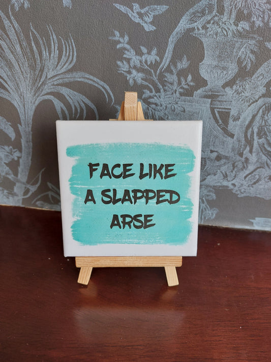 Face like a slapped arse Slogan Coaster