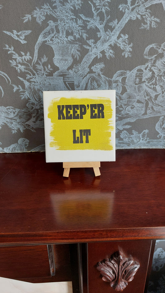 Keep 'er Lit Slogan Coaster